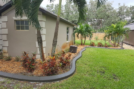 Stained Curbing: Courtyard Gray Brevard County Florida