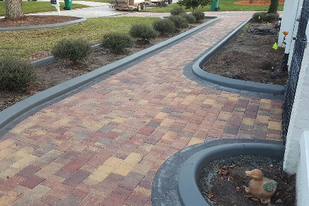 Stained Curbing: Courtyard Gray Brevard County Florida